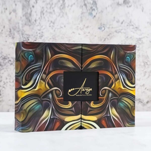 Captivating Aaraya Chocolate Box featuring exquisite fruit ganache, a symphony of rich flavors in every indulgent piece.