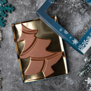 Indulge in the festive charm of Aaraya's Christmas Tree Chocolate Bar, a decadent treat crafted with the finest cocoa. Elevate your holiday moments with this luxurious creation, blending rich flavors and seasonal delight in every bite.