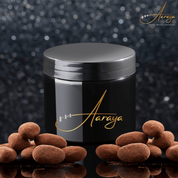 Close-up of Aaraya Chocolates' tempting Chocolate Coated Almonds, showcasing the perfect blend of premium nuts and luscious chocolate.