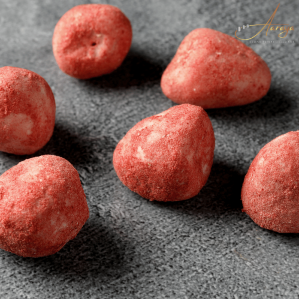 Strawberry Truffle by Aaraya Chocolates: A luxurious blend of real strawberries and velvety white chocolate, handcrafted for a unique sensory experience. Explore the best truffles in Dubai at Aaraya's boutique, a haven for chocolate enthusiasts.