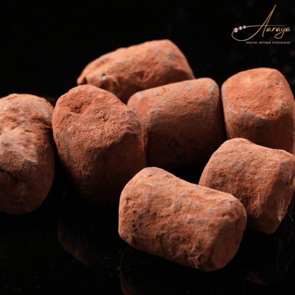 Hazelnut Truffle: Aaraya Chocolates' decadent creation, a perfect blend of velvety ganache and crunchy hazelnuts for a luxurious chocolate experience.