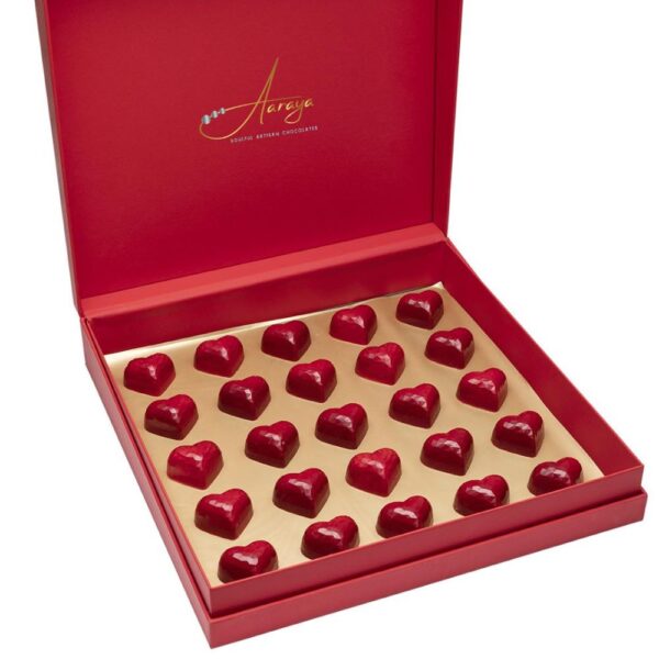 Indulge in Aaraya Chocolates' "Valentines" box—a collection of 25 heart-shaped, red chocolates, a luxurious expression of love.