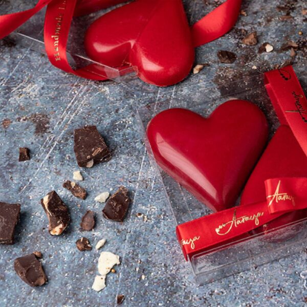 Aaraya Chocolates presents "Twin Hearts": Two red chocolate hearts, a lavish Valentine's Day gift of pure indulgence and passion.