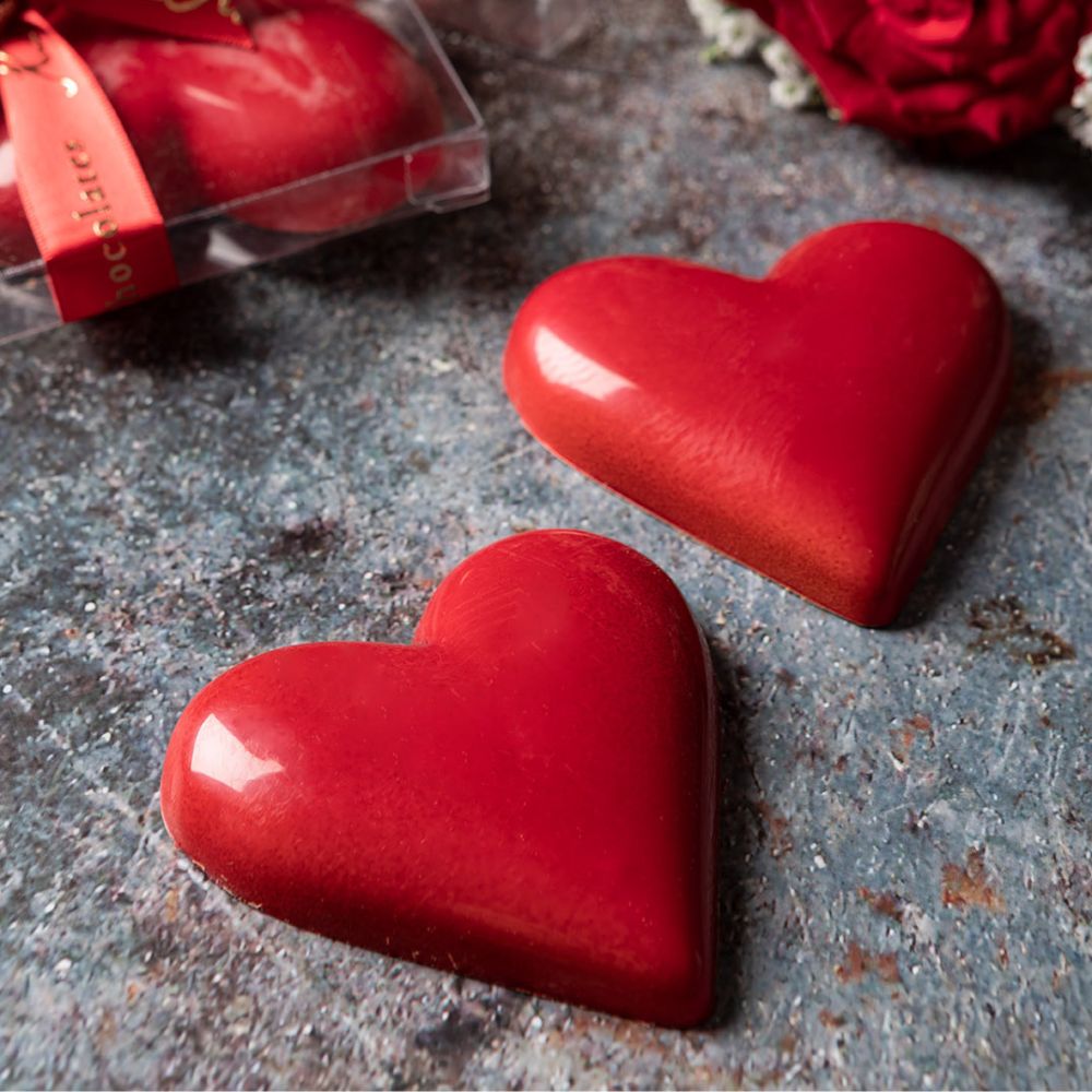 Aaraya Chocolates presents "Twin Hearts": Two red chocolate hearts, a lavish Valentine's Day gift of pure indulgence and passion.