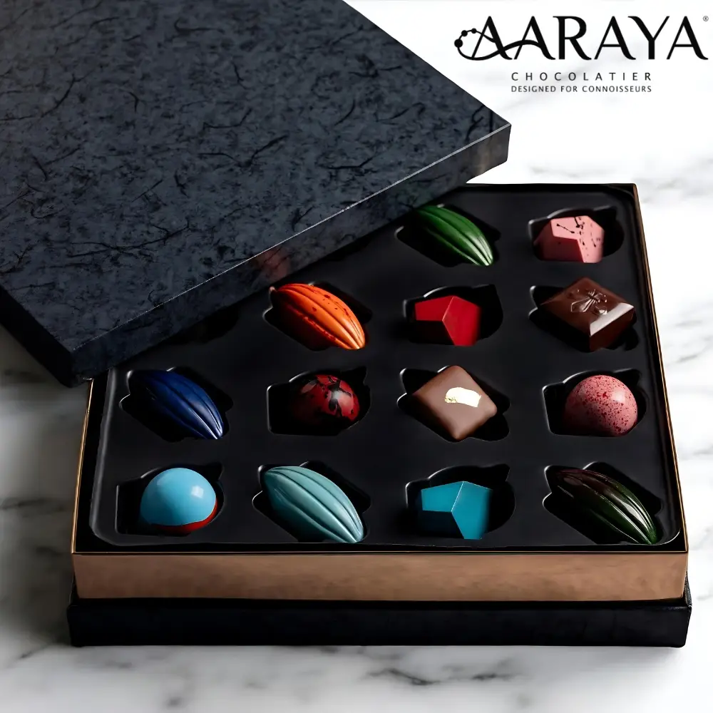 Assorted Chocolate Box - Luxe Black Collection Introducing the epitome of indulgence and refined taste the Aaraya Artisanal Premium Chocolate Signature Box.