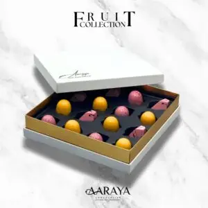 A beautifully arranged box of chocolates from the "Fruit and Chocolate Harmony Collection" by AARAYA® Chocolates. The box features an elegant assortment of handcrafted chocolates infused with vibrant fruit flavors, presented in a luxurious packaging that reflects the premium quality of AARAYA® Chocolates. Each piece is a perfect blend of rich chocolate and natural fruit essence, designed to offer a delightful and harmonious tasting experience.