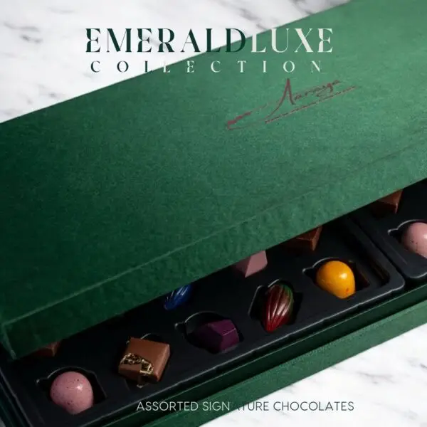 AARAYA® Assorted Chocolates Box - Emerald Luxe Collection in a luxurious green satin box, featuring premium handcrafted chocolates for gifting or indulgence