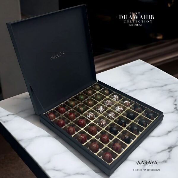 Luxurious DHAWAHIB Collection by AARAYA® Chocolatier for UAE National Day, featuring handcrafted premium chocolates elegantly arranged in beautifully designed boxes, celebrating tradition, unity, and pride