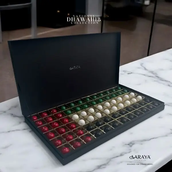 Luxurious DHAWAHIB Collection by AARAYA® Chocolatier for UAE National Day, featuring handcrafted premium chocolates elegantly arranged in beautifully designed boxes, celebrating tradition, unity, and pride