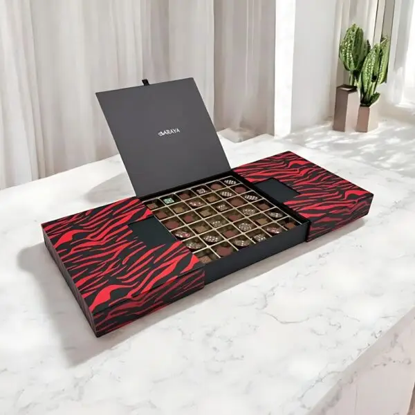 Festive Season Assorted Luxury Festive Chocolates Box by AARAYA® - Limited Edition 36-piece premium chocolate assortment in an elegant box, perfect for Christmas gifting and holiday celebrations. Luxurious chocolate collection weighing 3,500 grams