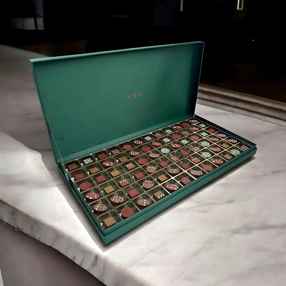 Emerald Luxe Festive Luxury Chocolates Box by AARAYA® featuring 36 handcrafted premium chocolates in a stunning emerald-inspired packaging, designed for Christmas gifting and festive celebrations, exuding elegance and sophistication