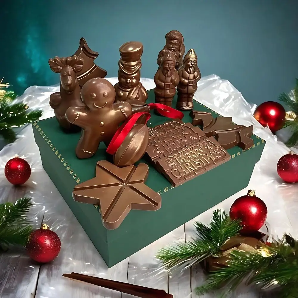 Magical Festive Chocolate Hamper by AARAYA® featuring handcrafted luxury chocolate figurines, including Santa Claus, reindeer, snowman, and more, elegantly packaged in a premium hamper box, perfect for Christmas gifting and celebrations.