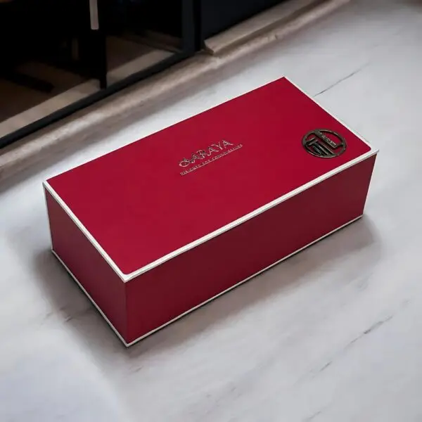 Ruby Luxury Chocolate Truffles Box by AARAYA® featuring 50 handcrafted premium truffles in an elegant box, perfect for gifting and celebrations. Dimensions: 27 CM X 13 CM X 9 CM, Total Weight: 955 grams.