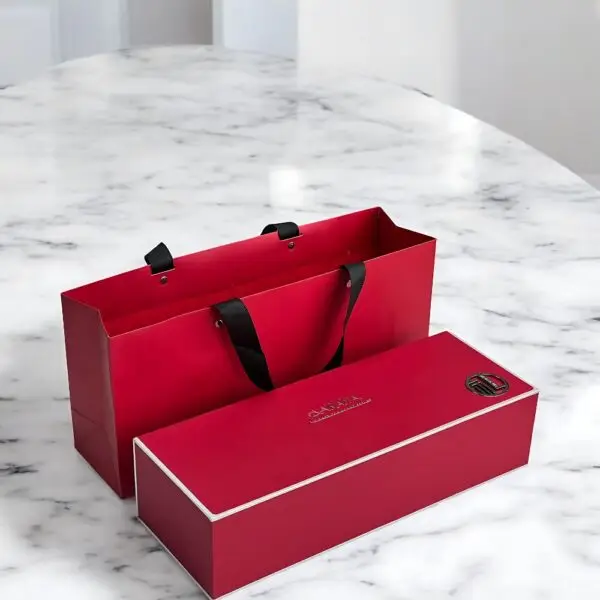 Scarlet Luxury Chocolate Truffles Box by AARAYA® featuring 100 handcrafted premium truffles in an elegant red and gold packaging, perfect for gifting and indulgence.