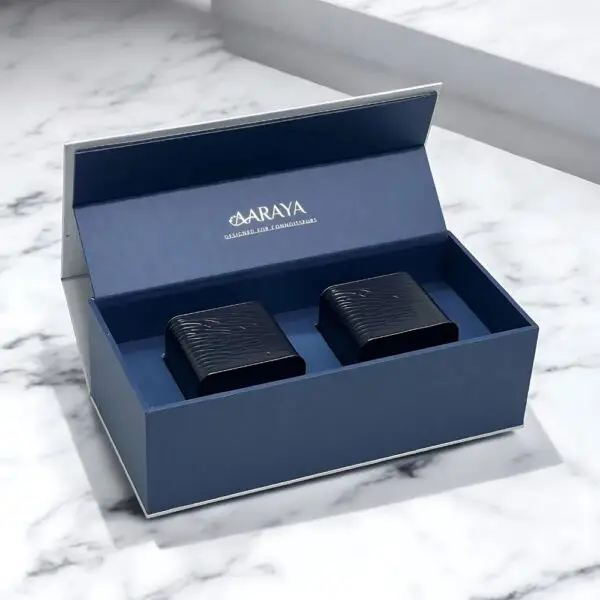 50 handcrafted luxury chocolate truffles in an elegant sapphire-inspired box by AARAYA®, perfect for gifting and special occasions. Premium quality and sophistication.