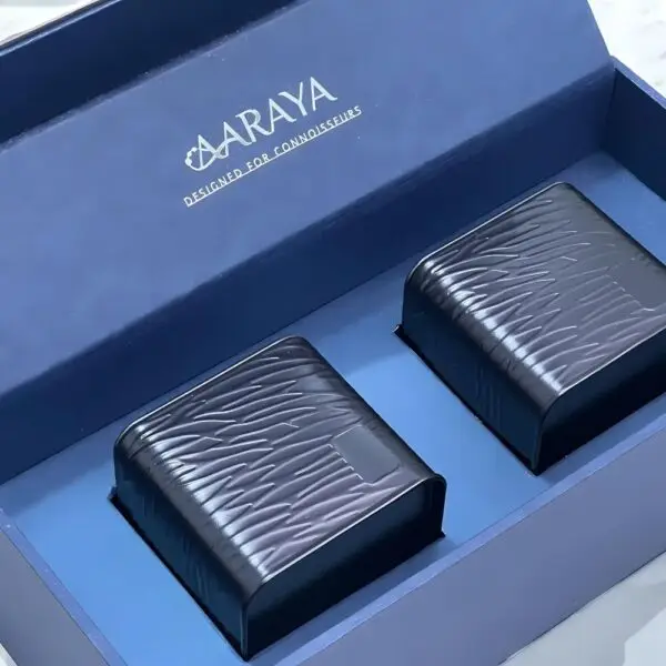 50 handcrafted luxury chocolate truffles in an elegant sapphire-inspired box by AARAYA®, perfect for gifting and special occasions. Premium quality and sophistication.