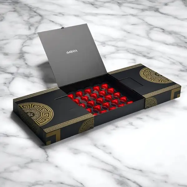 Luxurious Noir Elegance Valentine’s Day Love Box by AARAYA® with 25 heart-shaped premium chocolates in a black and gold design.